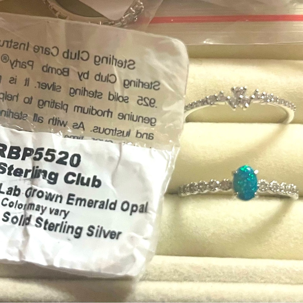 Beautiful Bomb Party Sterling Club lab created emerald Opal. Two rings size 9